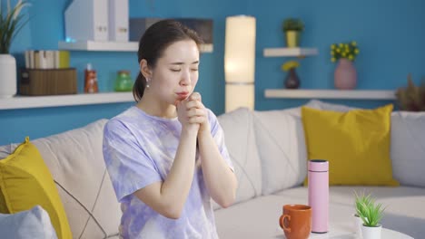 praying asian young woman.