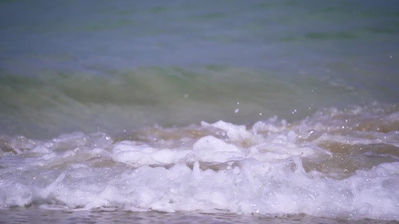 Ocean Waves Crashing on Sandy Beach