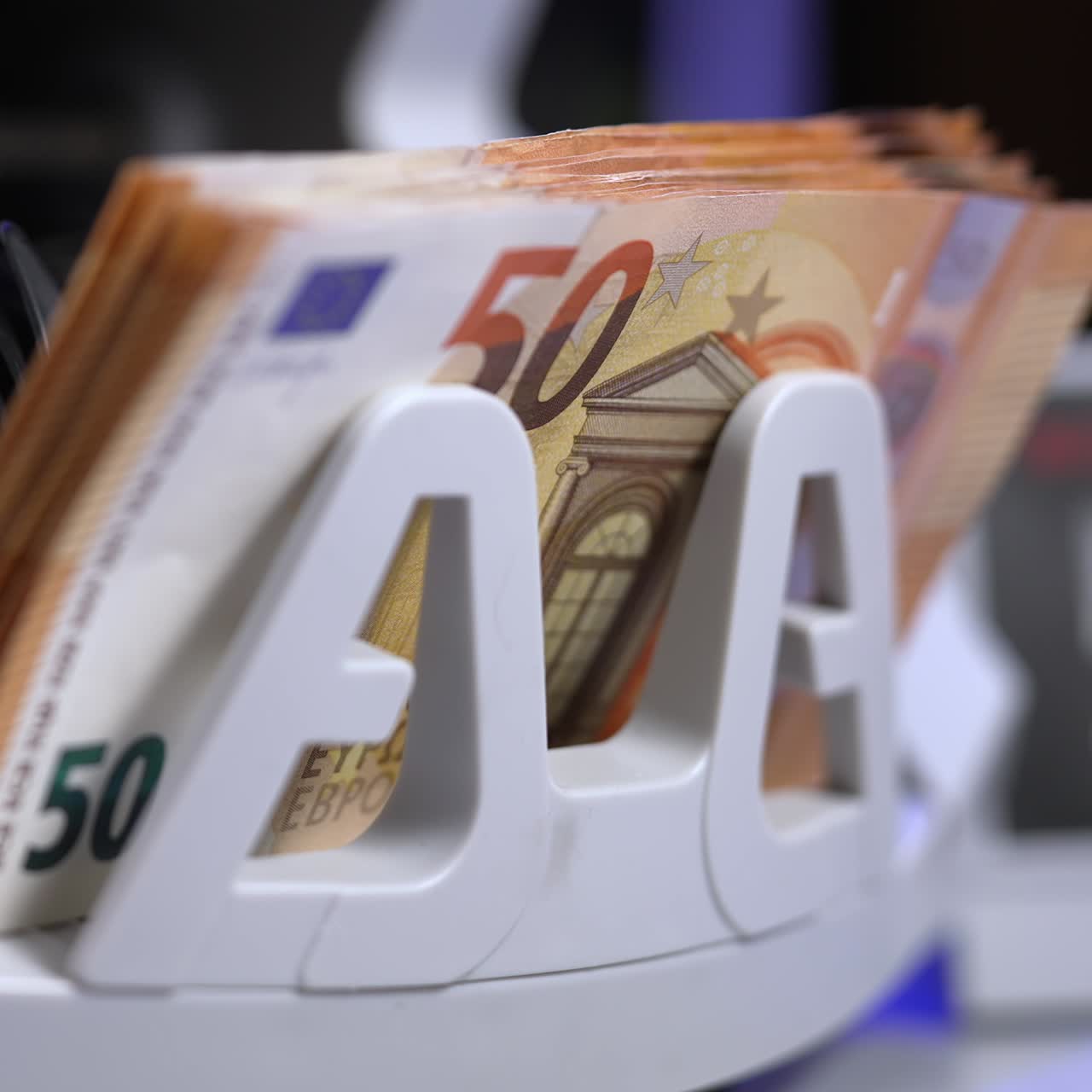 Currency counting machine counts bills. Automatic machine for bank financial operations