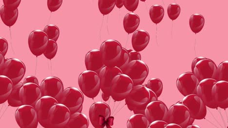 globos redondeados de color rosa profundo brillante flotando lentamente sobre un fondo rosa
