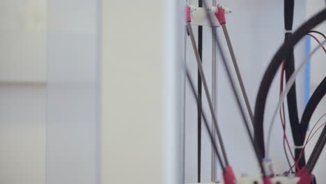 close-up of the mechanical components of a 3d printer or similar machine