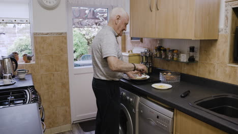 elderly man cooking in the kitchen