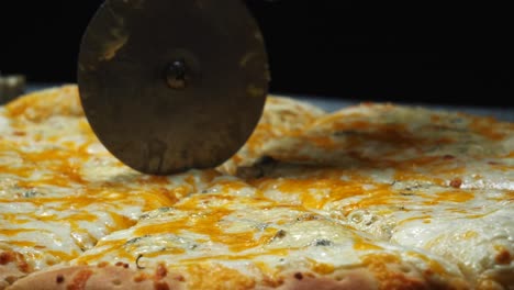 close-up of a sliced cheese pizza