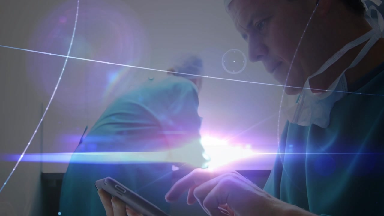 Animation of network of connections over caucasian male surgeon using tablet