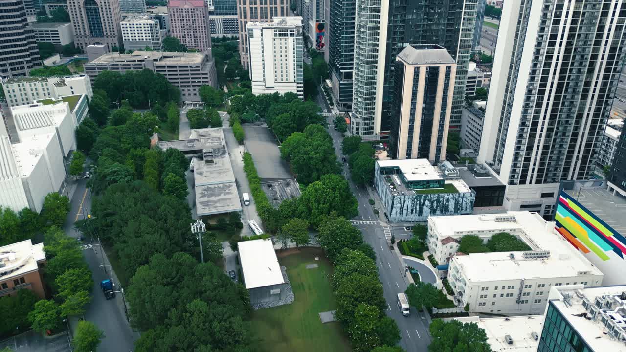 Aerial View Of Atlanta Cityscape With Tall Buildings And Urban Park Along W Peachtree Street In Atlanta, Georgia. slow motion, tilt-up shot