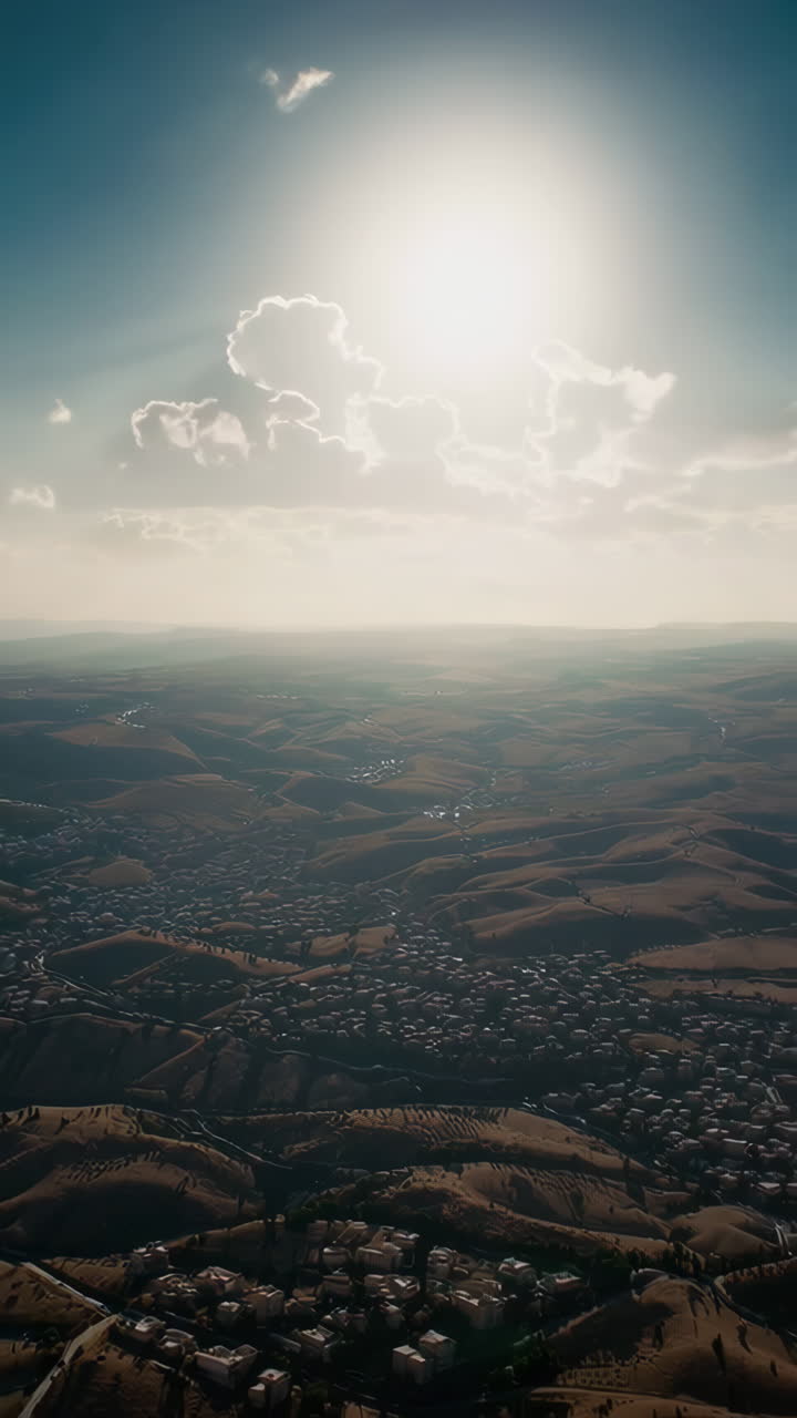Dramatic Aerial View of a Town Under a Stormy Sky and Jesus on a Horse