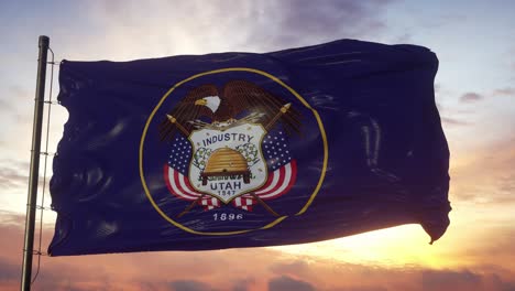 flag of utah waving in the wind against deep beautiful sky at sunset