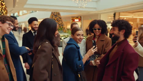 people celebrating the holidays at the mall