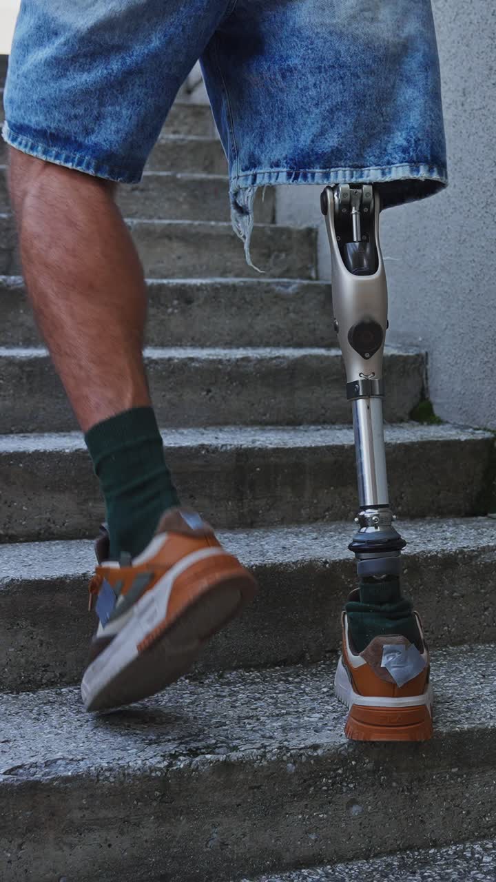 Person with Prosthetic Leg Climbing Stairs