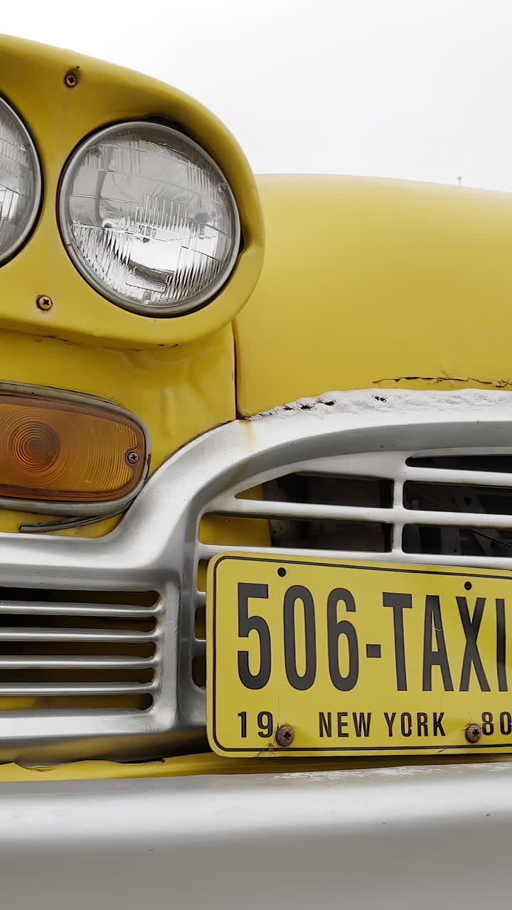 Vintage Yellow Taxi with 506-TAXI License Plate