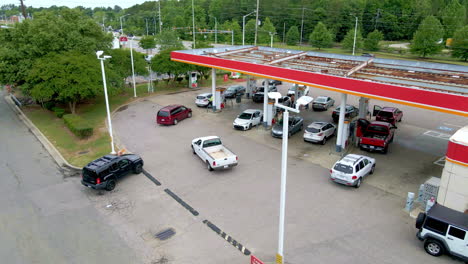 drone shot of cars lined up for gas during a gas shortage