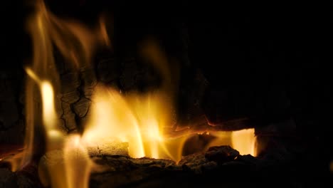 fireplace real natural wood burning in fireplace, up-close cozy warm flames