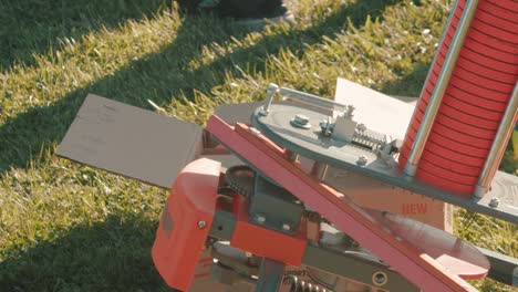 clay pigeon launcher firing clay pigeons off camera