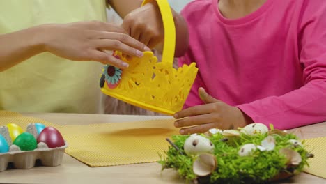 mother and child making easter baskets