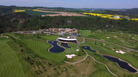 aerial drone view of golf course and ponds