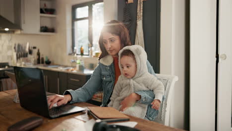 working mom with baby at home