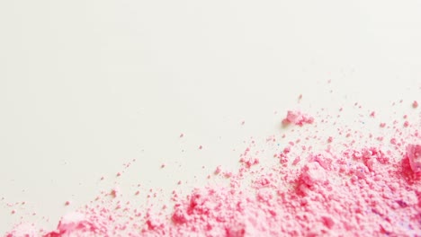 Video-of-pink-powder-with-copy-space-on-white-background