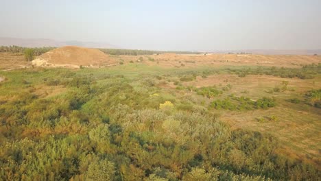 aerial footage over jordan river, beit shean valley