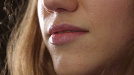 Closeup-of-smiling-woman's-lips