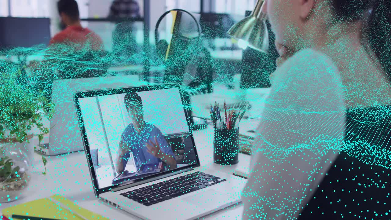 Woman leaning, watching laptop in remote meeting, speaker starting teal band sweeping listening