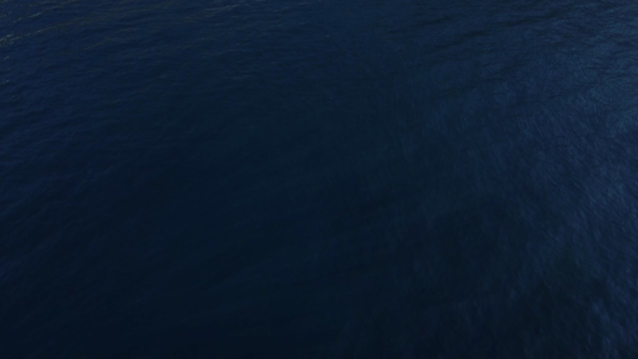 Aerial Drone shot Tilt Up from Ocean Fly in to Positano Beach, Italy