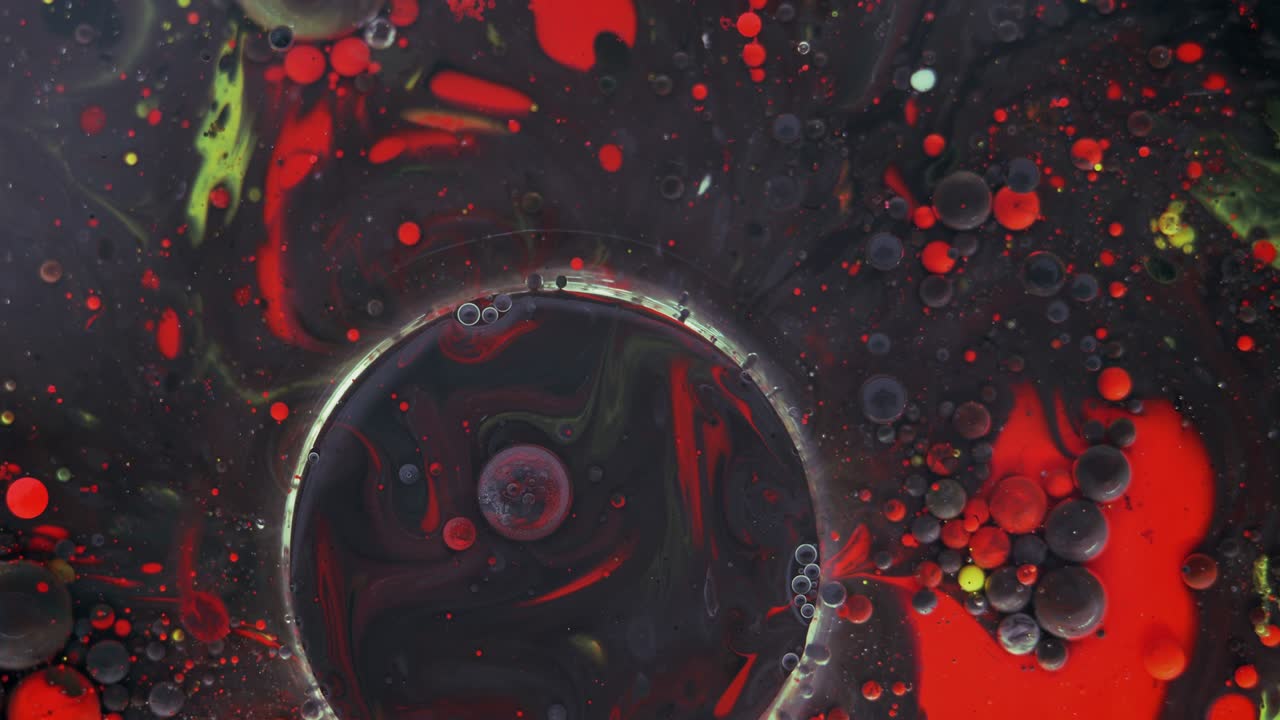 흑색 배경에 추상적인 빨간색, 노란색, 초록색 혼합물, 예술적인 색상 페인트 배경.