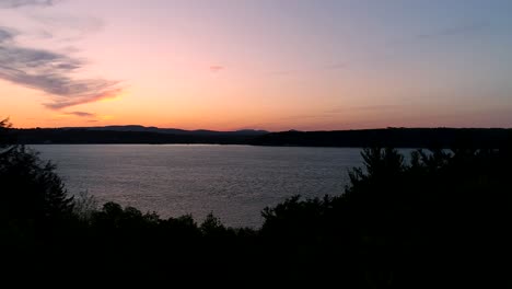 Beautiful-sunset-on-a-big-river-in-Quebec,-Canada