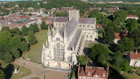 lowering drone shot of winchester cathedral filmed in summer in hampshire, uk