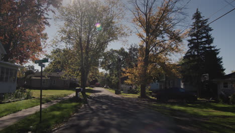 drive forward on a road through a typical american city