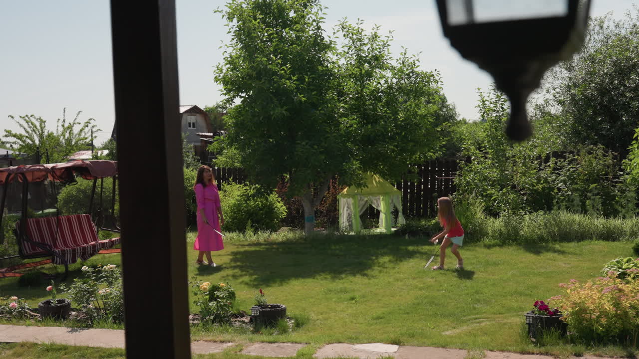 Family Spends Day, Family Members Share Happy Outdoor Experiences, Relaxed Family Bonding In Peaceful Garden Setting, Cheerful Day Of Togetherness And Joy Shared In Tranquil Garden Environment
