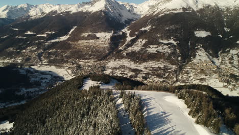 picturesque high view over alpine ski trail in wintertime