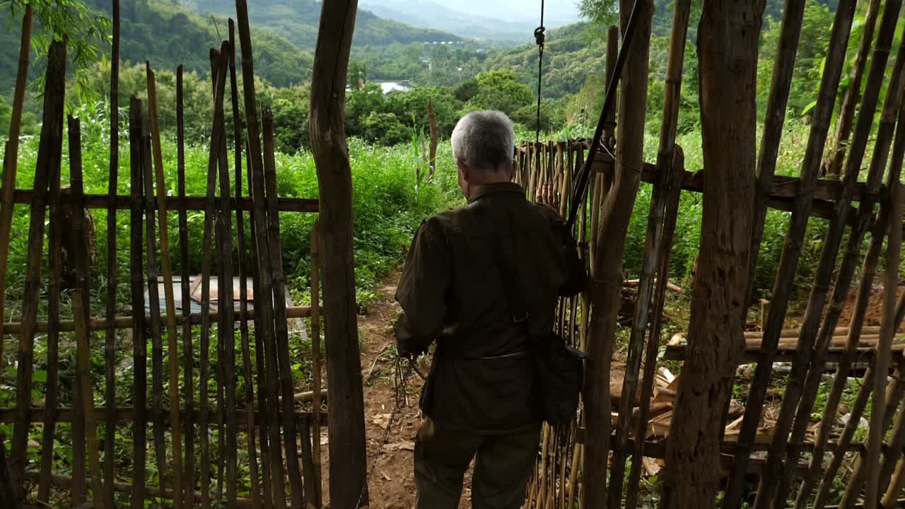 Senior Man With Gun At His Back Going To Hunt