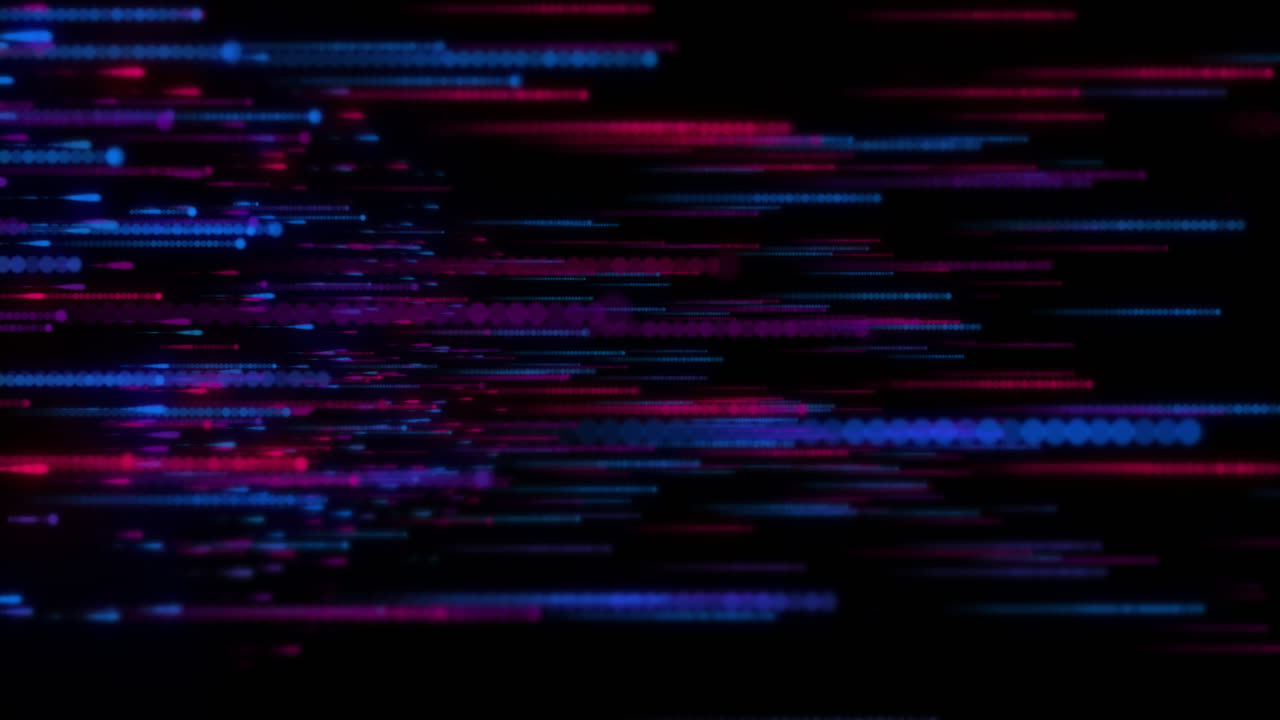 Animation of glowing light trails moving over black background