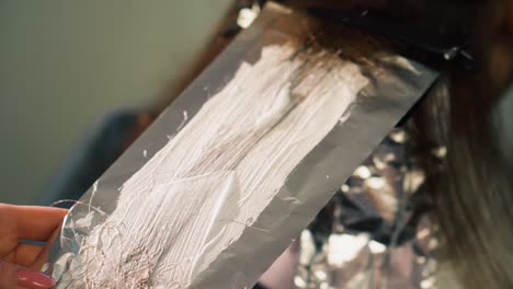 close up view of customer having hair dye applied