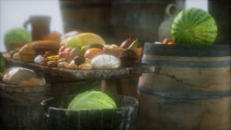 food table with wine barrels and some fruits, vegetables and bread