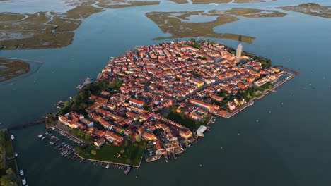 panoramic aerial view of the colorful houses of burano island in the venetian lagoon, italy.