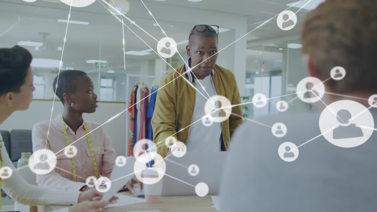 Animation of network of connections over diverse business people in office