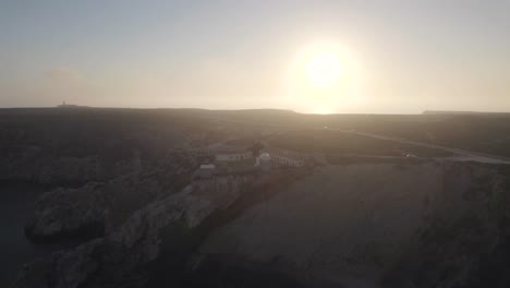 Fortress-of-Beliche-on-top-of-cliffs-against-sunset-sunbeam