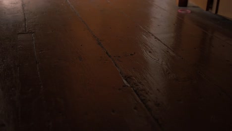 Evening-sunlight-glow-on-old-wooden-floorboards