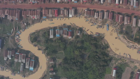 aerial of village on stilts in cambodia