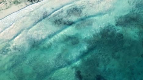 Ocean-water-ripples-forming-wave-on-the-coastal-beach-of-Mexico