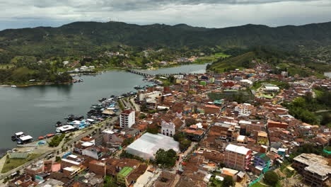 drone shot approaching the church in the guatape village, in antioquia, colombia