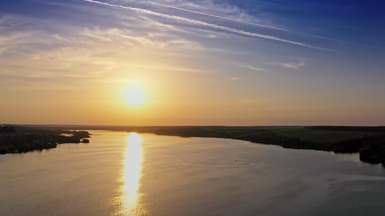 Landscape with sunset over river. Aerial view of sunset time river water horizon
