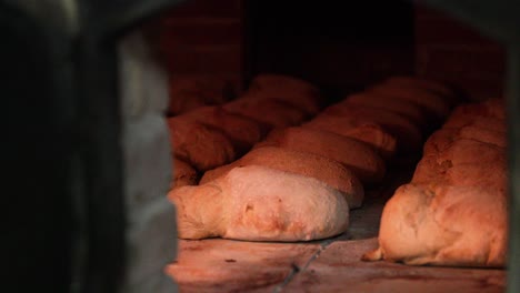 cooking and baking breads inside the hot oven