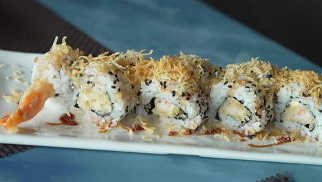 Panning-shot-of-Ebi-ten-roll,-close-up-view