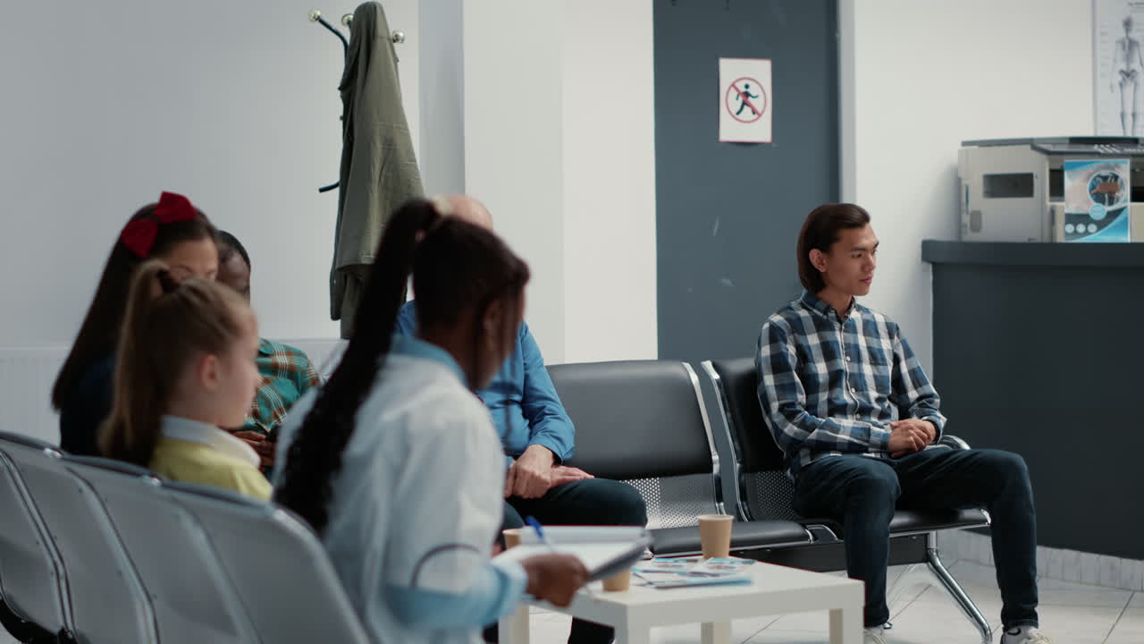 People waiting in a hospital waiting room