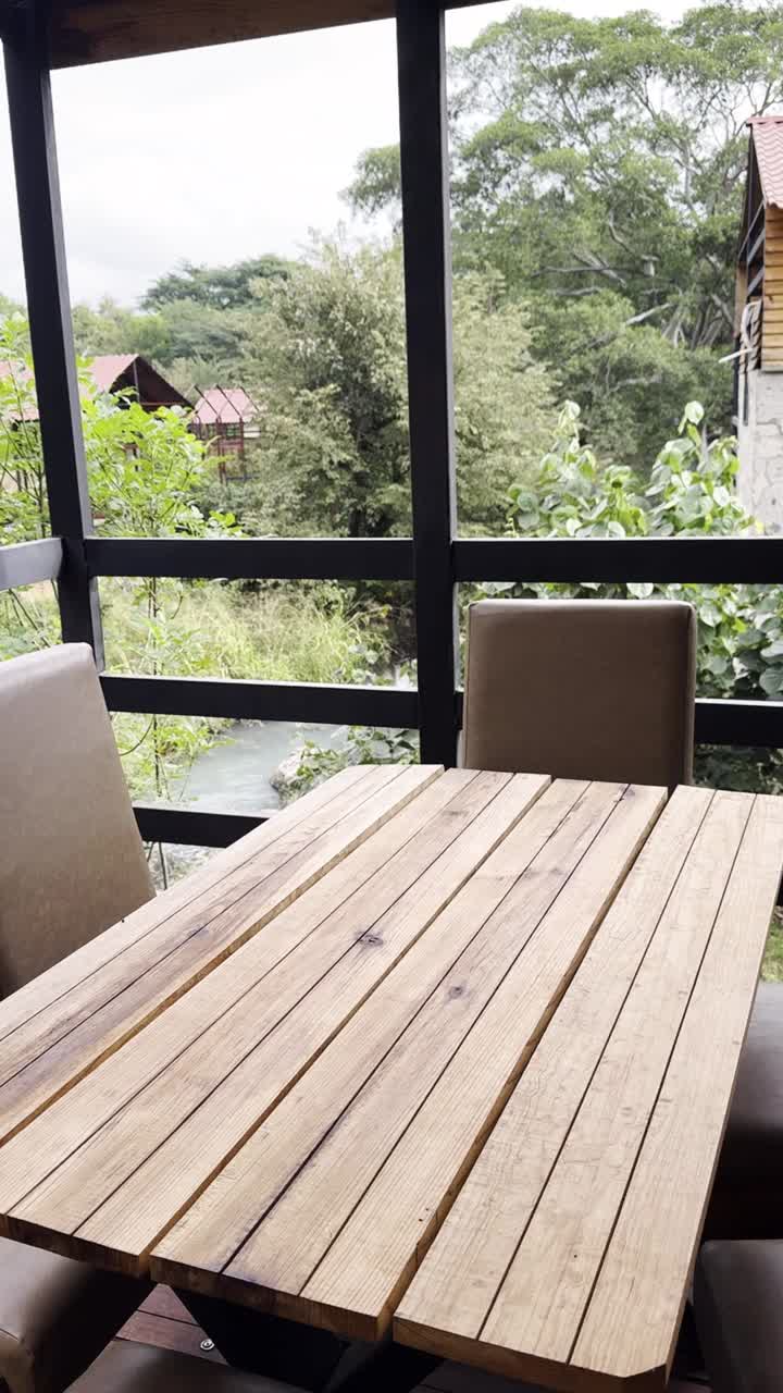 Vacation spot with cute cabins and dining room, vertical shot