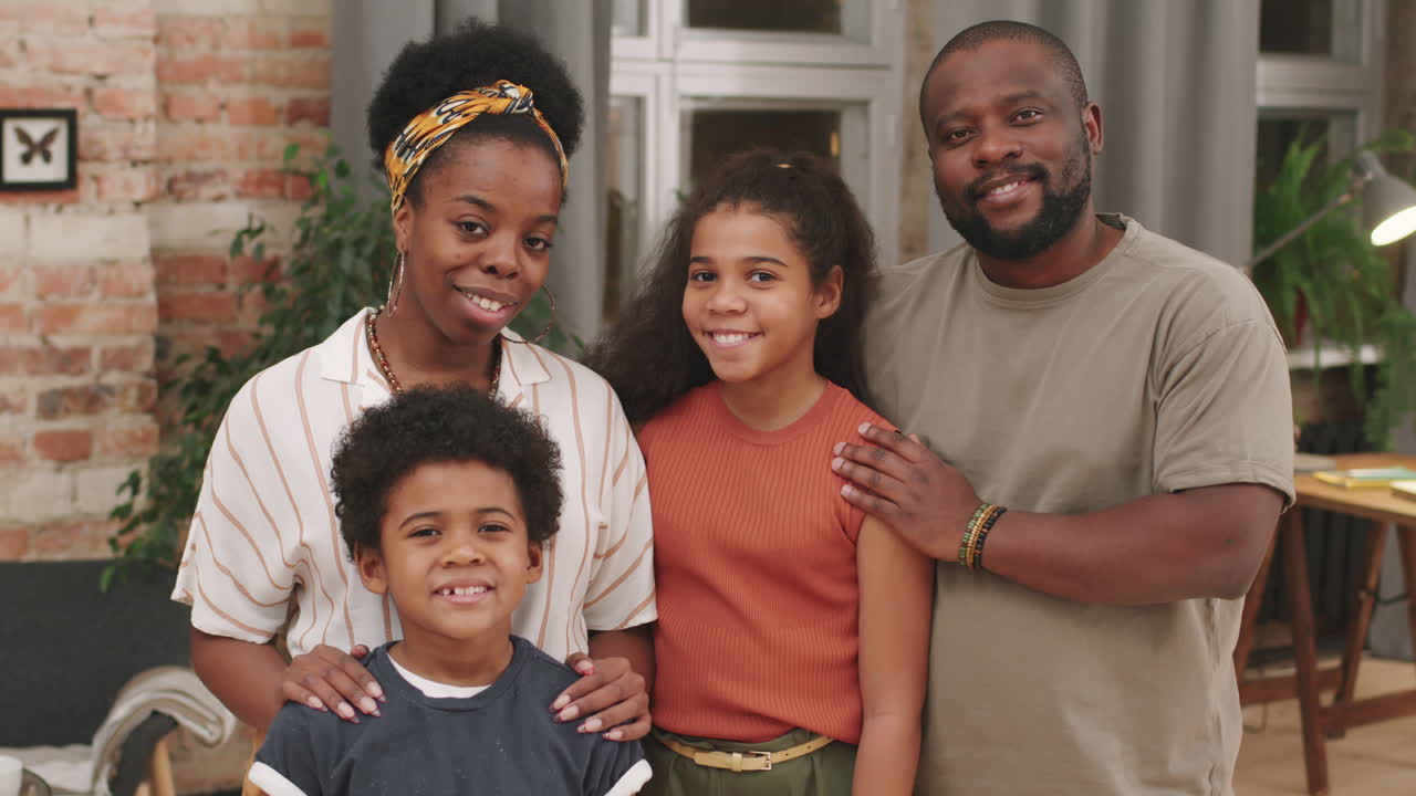 Portrait Of Happy Afro Family Of Four