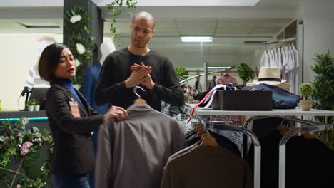 customer trying on clothes in a clothing store