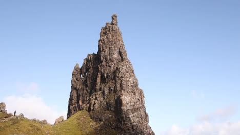 panning-up-on-the-old-man-of-storr-giant-rock-on-Isle-of-Skye,-hIghlands-of-Scotland